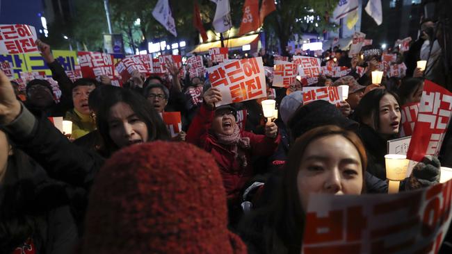 Thousands of South Koreans took to the streets of the capital on Saturday calling for increasingly unpopular President Park Geun-hye to step down. Picture: AP.
