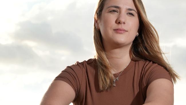 At Glenelg, Alannah Bercys,27, suffers from PMDD (premenstrual dysphoric disorder), experiencing symptoms such as extreme fatigue, exhaustion, anxiousness, paranoia, depression and brain fog. 28 March 2025. Picture: Dean Martin