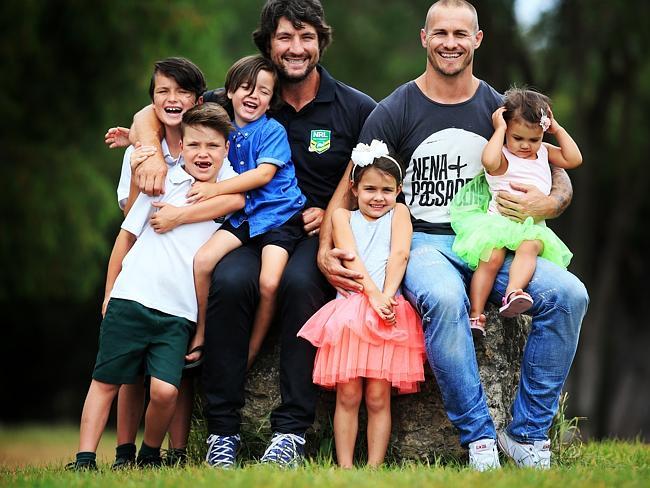 Nathan Hindmarsh with his boys Rowdie, 4, Buster, 6, and Archie, 8, and Matt Cooper with his girls Starr, 2, and Indie, 4.