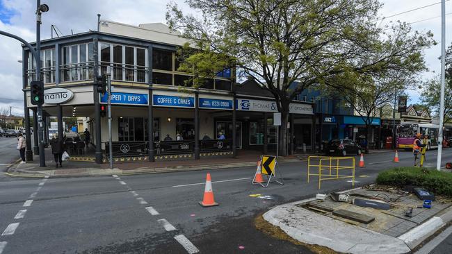 Work on a new intersection outside Cafe Manto on The Parade in Norwood. The cafe will close next week. Picture: Roy VanDerVegt