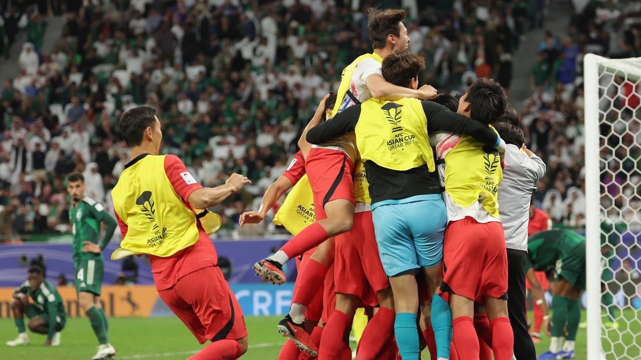 South Korean players celebrate during their match with Saudi Arabia. Picture: Lintao Zhang/Getty Images