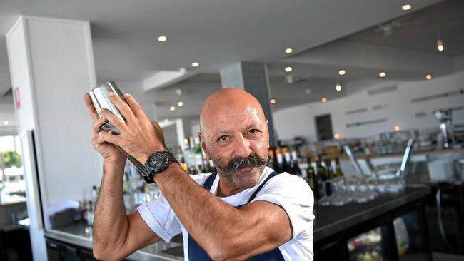 MIX UP: Pier 33's Franki Karim mixing a up a drink at the bar. Picture: Warren Lynam