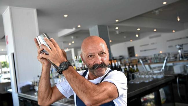 MIX UP: Pier 33&#39;s Franki Karim mixing a up a drink at the bar. Picture: Warren Lynam