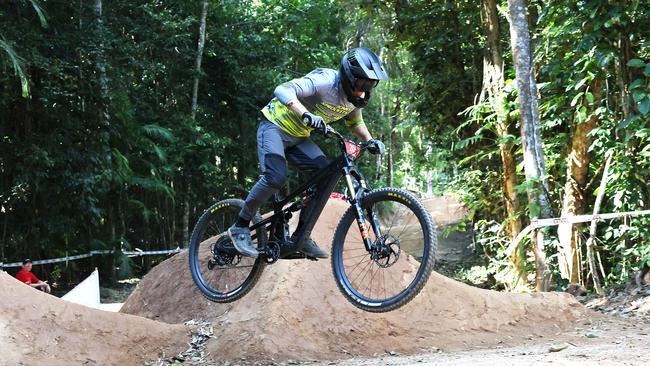 Oliver Colthup flies off a jump in the U19 Men’s Dual Slalom quarter finals at the first day of the Cairns round of the Crankworx World Tour, held at the Smithfield Mountain Bike Park. Picture: Brendan Radke
