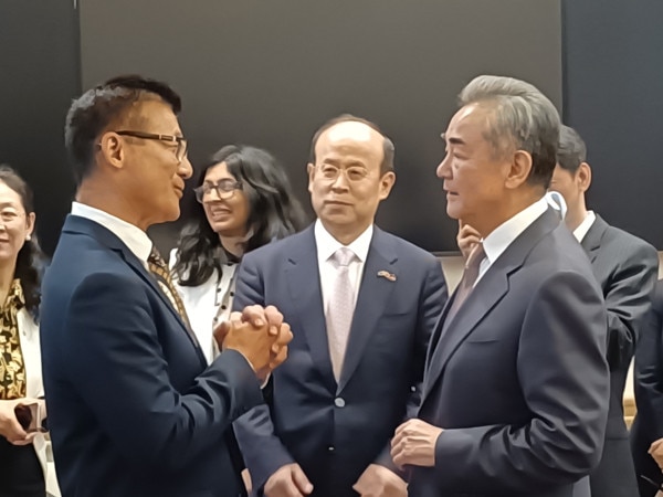 Labor MP Sam Lim, who holds the marginal seat of Tangney, meets Chinese Foreign Minister Wang Yi in Canberra in March.