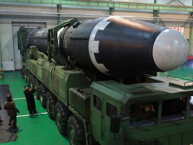 Kim Jong-un views the Hwasong-15 ICBM. Picture: KCNA/KNS via AP