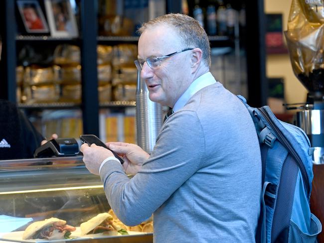 Philip Lowe, the Governor of the Reserve Bank of Australia buys some lunch before heading to the office in Sydney., Picture: Jeremy Piper