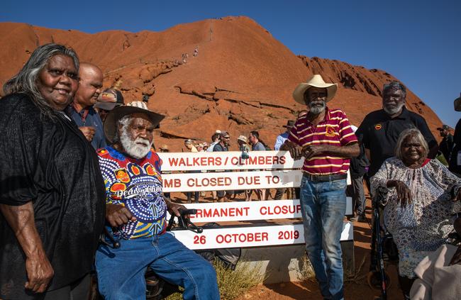 Minja Jean Reid Uluru, Reggie Uluru, Cassidy Uluru, and Barbara Tjikadu after the final close of the walk. Picture: EMMA MURRAY