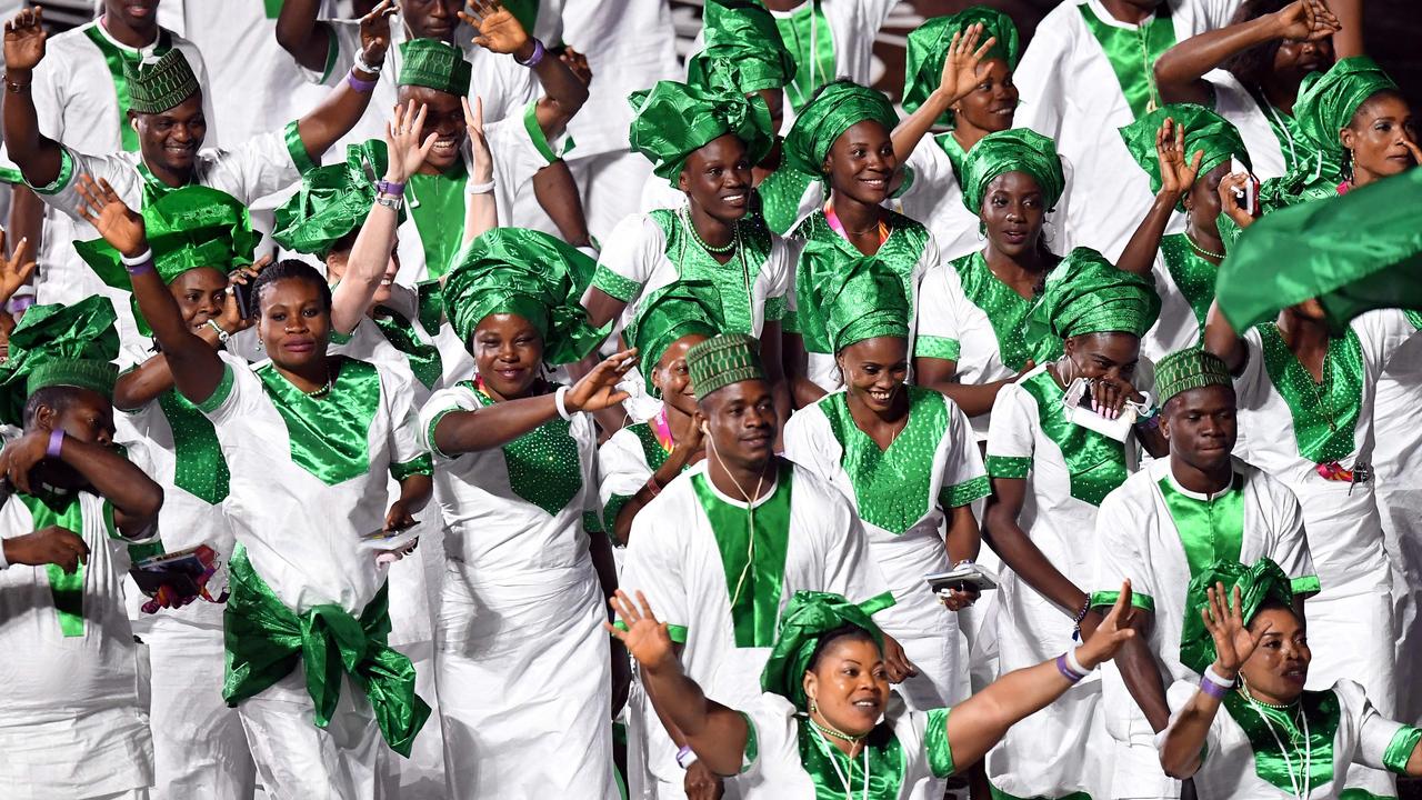 The Nigerian delegation make their way into the stadium.