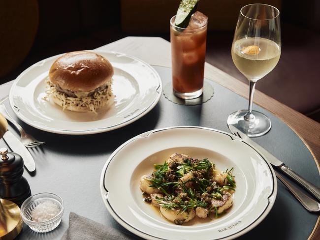 Ricotta gnudi with butter prawns and sea herbs; and the Bar Julius Burger. Picture: Supplied
