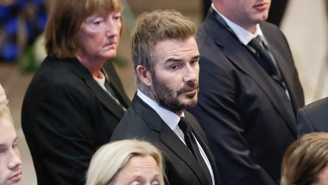 Former football player David Beckham (C) leaves the church after the funeral service  for late Swedish football manager Sven-Goran Eriksson at Fryksande church in Torsby, Sweden, on September 13, 2024. Swedish football manager Sven-Goran Eriksson, who coached England from 2001 to 2006, died on August 26, 2024 at the age of 76 after a battle with pancreatic cancer, his agent said. (Photo by Adam Ihse/TT / various sources / AFP) / Sweden OUT