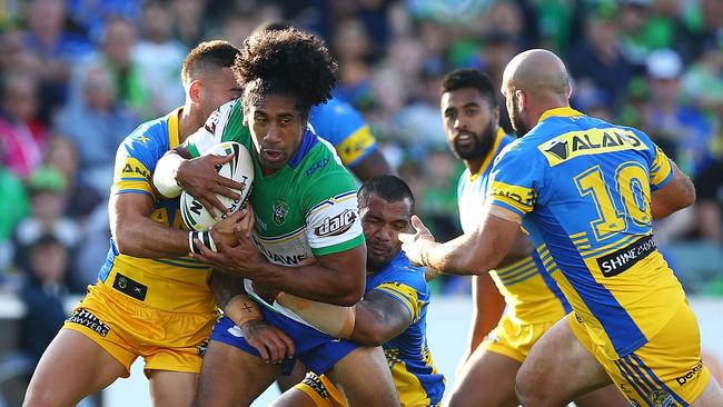 CANBERRA, AUSTRALIA — APRIL 01: Iosia Soliola of the Raiders is tackled during the round five NRL match between the Canberra Raiders and the Parramatta Eels at GIO Stadium on April 1, 2017 in Canberra, Australia. (Photo by Mark Nolan/Getty Images)