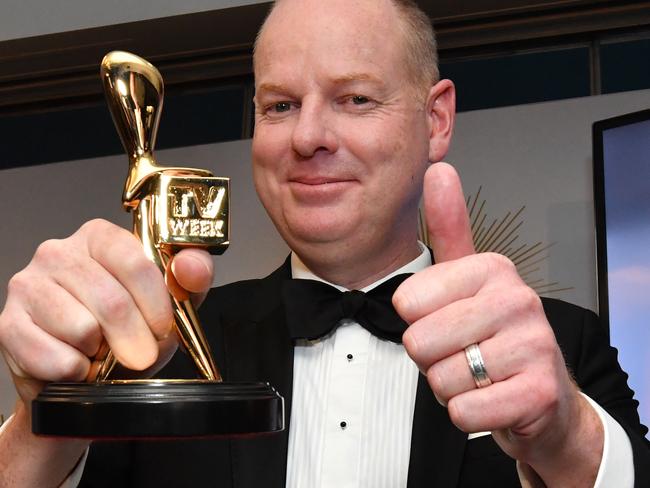 Tom Gleeson poses for a photograph after winning the Gold Logie for most popular personality on Australian TV during the 2019 Logie Awards at The Star Casino on the Gold Coast, Sunday, June 30, 2019. (AAP Image/Darren England) NO ARCHIVING, EDITORIAL USE ONLY