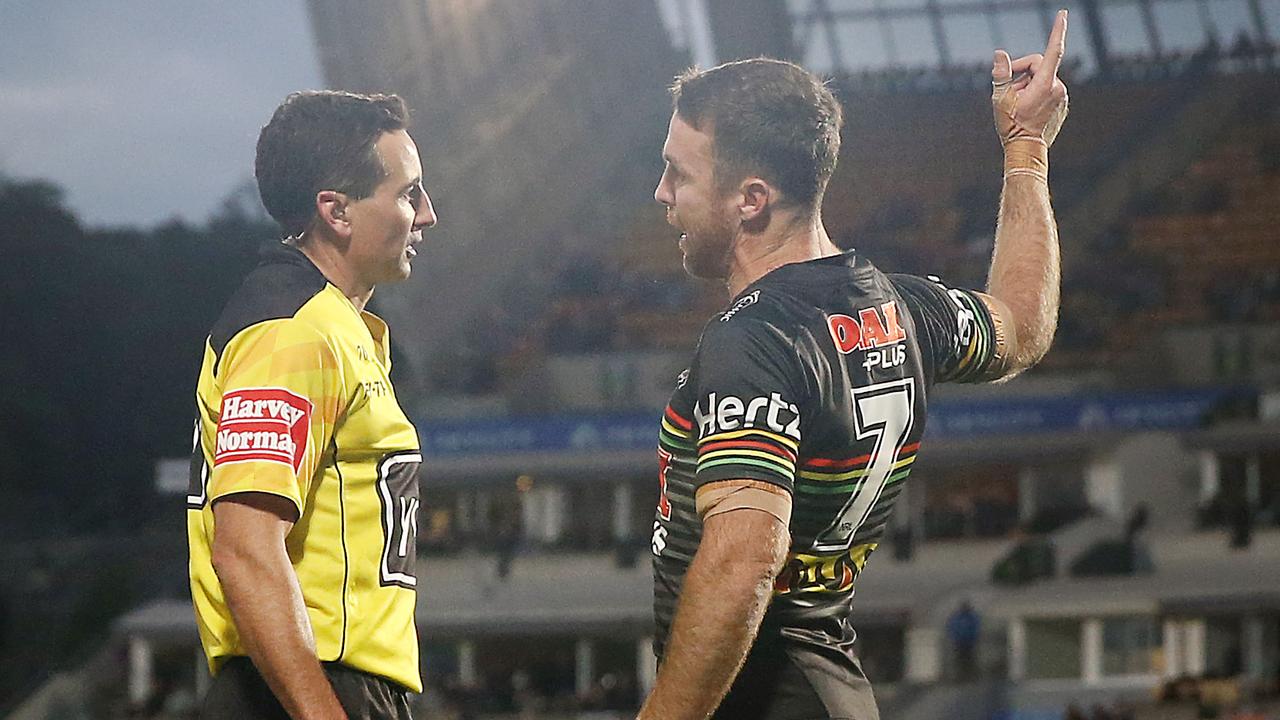 James Maloney of the Panthers makes a case to referee Gerard Sutton after a dubious bunker call.