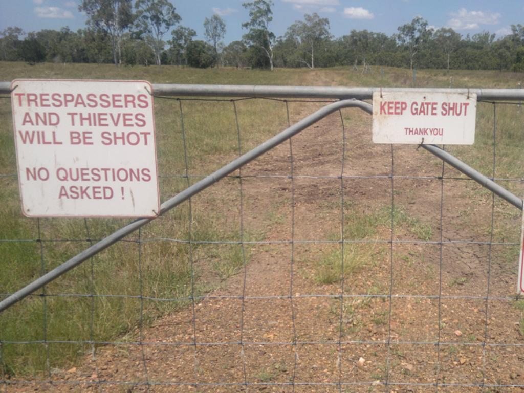 Signs on a fence on a property on South Yaamba Road in Central Queensland. Photo contributed