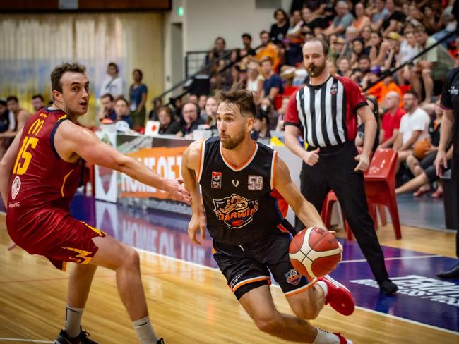 Molnar dribbles towards the basket against Logan Thunder at Marrara. Picture: Ben Thompson/Darwin Salties.