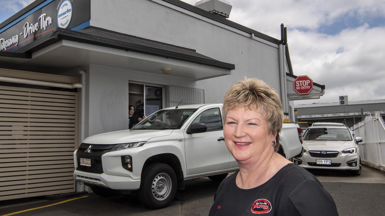 Tracie Batzloff and the busy drive thru at the Pump123 store on Russell St, Toowoomba. Photo: Nev Madsen