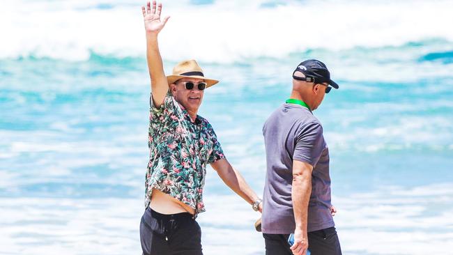 Tom Hanks enjoying a stroll along the beach in Broadbeach on the Gold Coast. Picture: News Corp