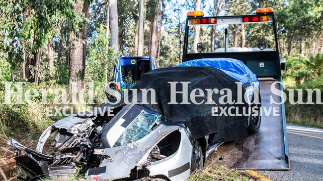 The Lotus is towed away. Picture: Stuart Walmsley