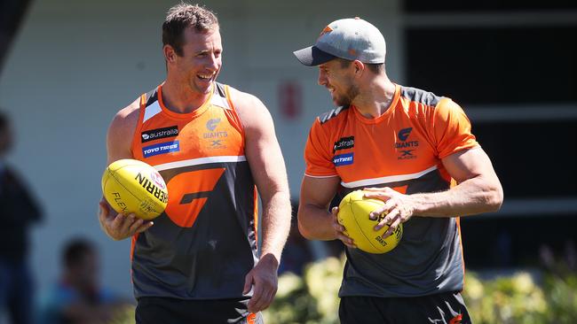 Steve Johnson and Brett Deledio walking laps during GWS training. Picture: Phil Hillyard