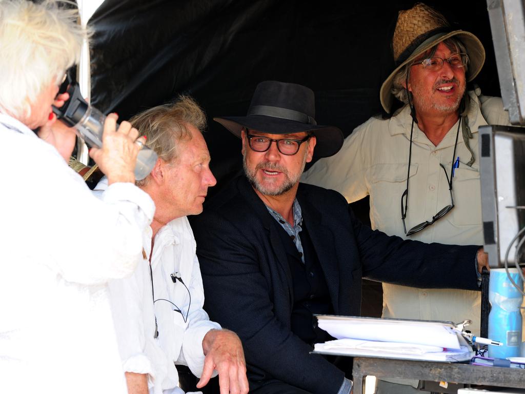 Russell Crowe stars and directs his first film The Water Diviner in a scene on Australia Plains. Russell still in character watches back a marathon 24 minute take. Picture: Mark Brake