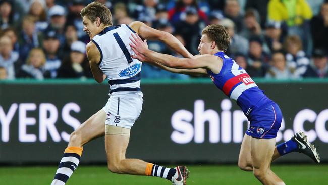 Rhys Stanley evades Shane Biggs during a remarkable performance against the Bulldogs. Picture: Getty Images