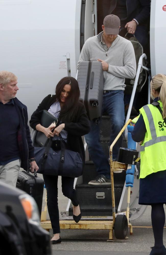 The Duchess of Sussex carried a stylish black leather portfolio. Picture: Backgrid