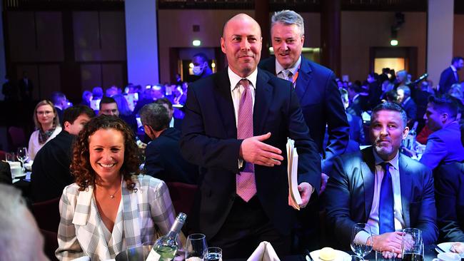 Josh Frydenberg, centre, with wife Amie in the Great Hall at Parliament House on Wednesday. Picture: Getty Images