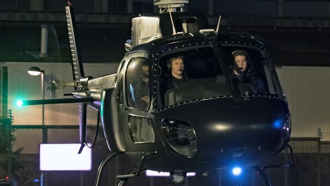 Cruise was joined by two male passengers for the helicopter ride. Picture: Backgrid.