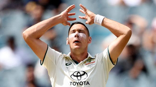 Australia's Scott Boland reacts to a missed catch on on the third day of the fourth cricket Test match between Australia and India at the Melbourne Cricket Ground (MCG) in Melbourne on December 28, 2024. (Photo by Martin KEEP / AFP) / --IMAGE RESTRICTED TO EDITORIAL USE - STRICTLY NO COMMERCIAL USE--