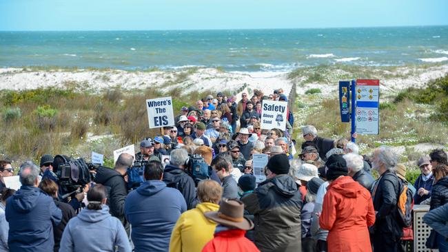 Local residents protest at Semaphore Beach about government plans to cart sand to other beaches. Picture: Brenton Edwards/AAP