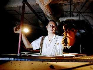 Amalgamated Pest Control technician Ricky Brewer finds a decaying rat carcass in this Goonellabah ceiling cavity. Experts say rats are currently enjoying a ‘population explosion’. . Picture: David Nielsen