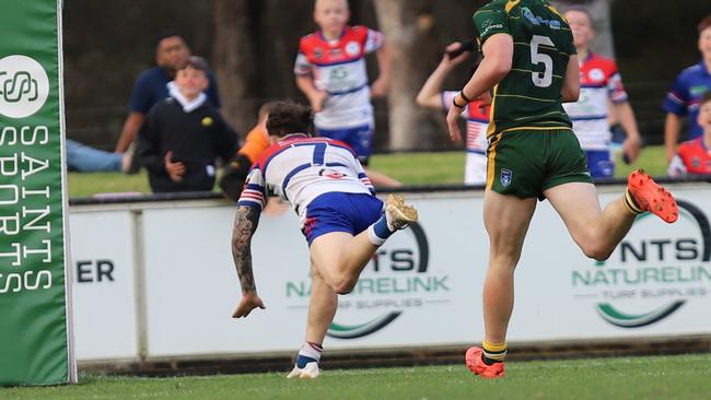 Jake Stig races away to score for Emu Plains. Picture: Steve Montgomery