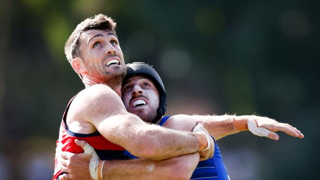 MELBOURNE, AUSTRALIA - FEBRUARY 22: Tom Campbell of the Demons and Tristan Xerri of the Kangaroos compete in a ruck contest during the 2025 AFL match simulation between the North Melbourne Kangaroos and Melbourne Demons at Arden Street on February 22, 2025 in Melbourne, Australia. (Photo by Dylan Burns/AFL Photos via Getty Images)