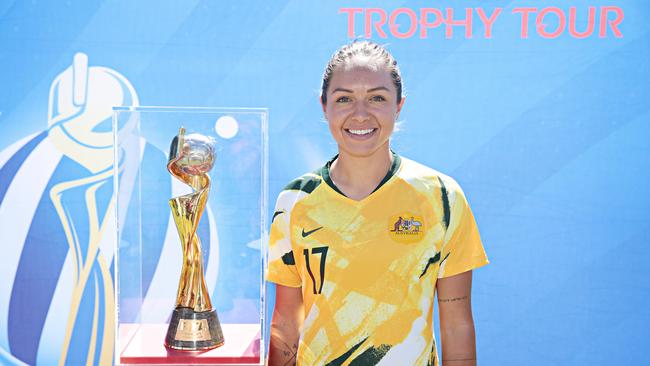 Kyah Simon poses with the World Cup - which Australia will host in 2023. Photographer: Adam Yip