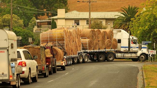 A convoy provides much needed relief to the isolated town of Buchan in the aftermath of the Victorian Bushfire crisis. Picture: Mark Stewart