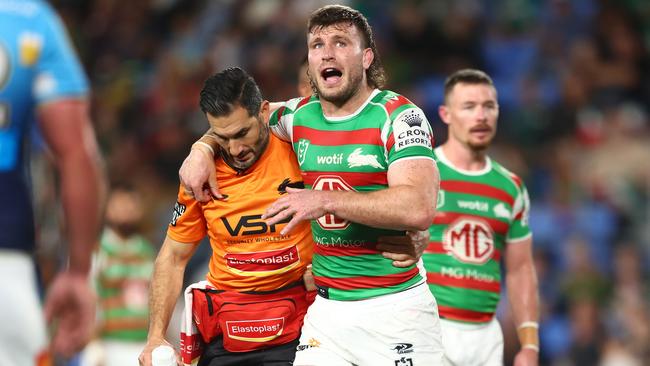 GOLD COAST, AUSTRALIA - JUNE 03:  Jai Arrow of the Rabbitohs is helped from the field during the round 14 NRL match between Gold Coast Titans and South Sydney Rabbitohs at Cbus Super Stadium on June 03, 2023 in Gold Coast, Australia. (Photo by Chris Hyde/Getty Images)