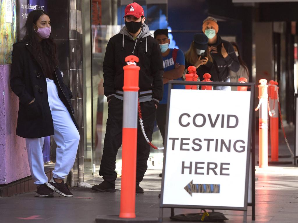 People queue up for COVID-19 testing in Melbourne. Picture: William West/AFP