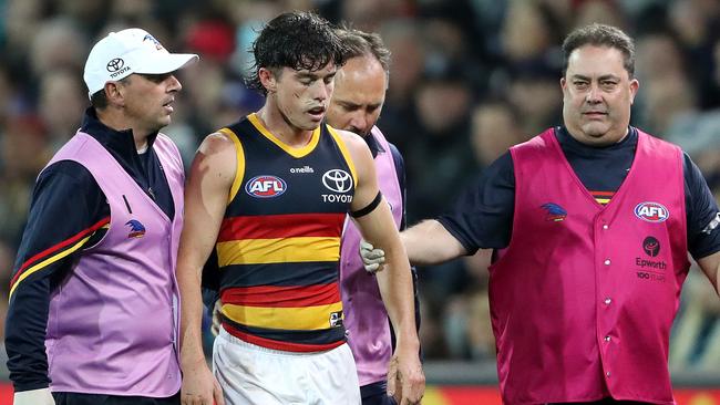 Ned McHenry had to be subbed out after the incident. Picture: Sarah Reed/AFL Photos/Getty Images