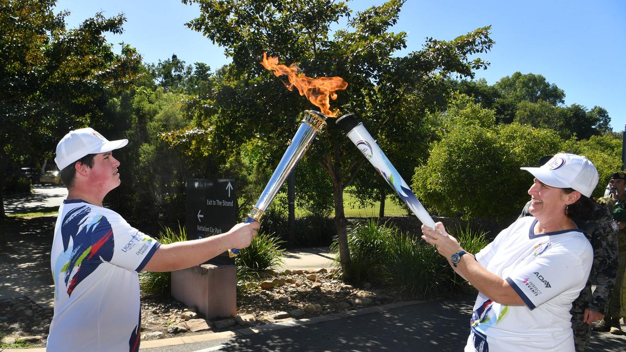 Legacy Centenary Torch Relay and community day at Jezzine Barracks. Torch bearers Mitchell Bingley and his mum Melissa Bingley. Picture: Evan Morgan