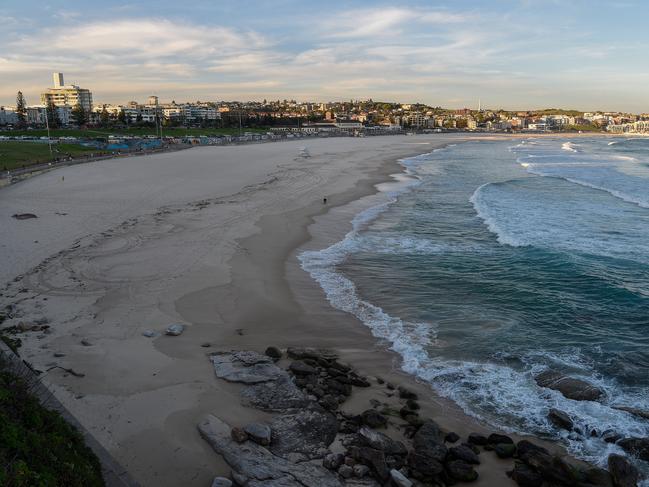 An empty beach is seen at Bondi Beach in Sydney, Friday, April 17, 2020. Several beaches across NSW remain closed to the public, with social distancing and lockdown rules still in place to try and combat the spread of Coronavirus (COVID-19). (AAP Image/Bianca De Marchi) NO ARCHIVING