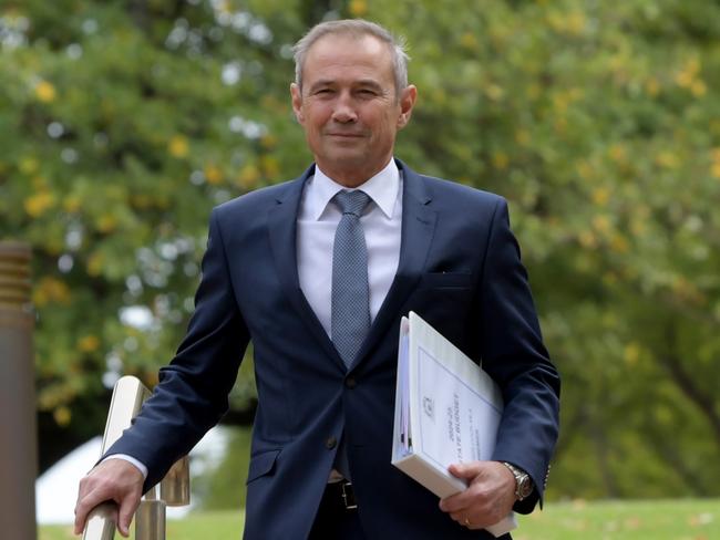 PERTH , AUSTRALIA - NCA NewsWire Photos  MAY 9 2024 .  Premier Roger Cook walks to Parliament with the budget papers. Picture: NCA NewsWire / Sharon Smith