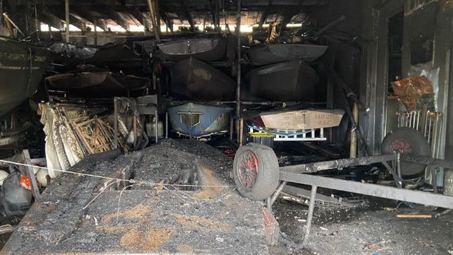 The burnt out interior of the storage area at the Narrabeen Lakes Sailing Club at Jamieson Park where 24 sailing boats, and two motorised safety boats, along with equipment, was stored. Picture: Narrabeen Lakes Sailing Club