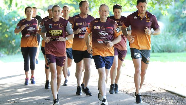 Mr Shorten joined Brisbane Broncos players Ali Brigginshaw and Darius Boyd at Red Hill for a run on Monday. Picture: Peter Wallis