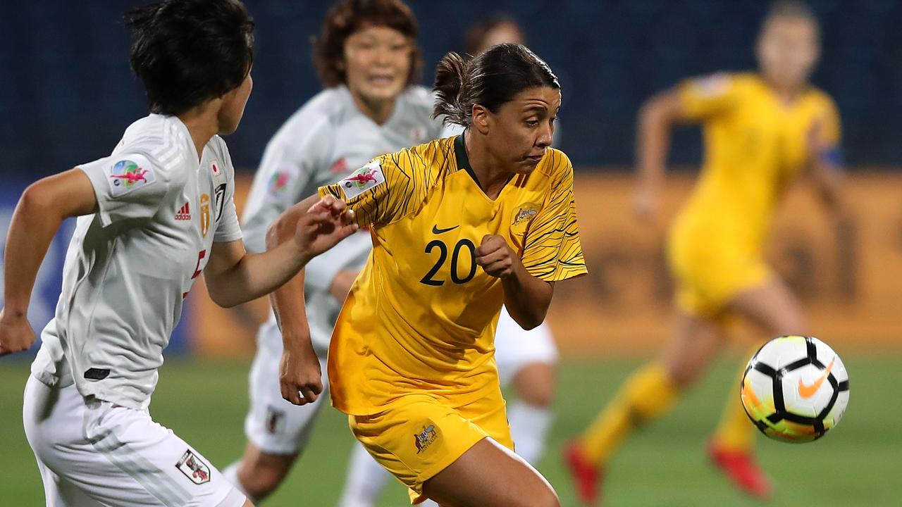 AMMAN, JORDAN - APRIL 20:  Samantha May Kerr of Australia and Nana Ichise of Japan in action during the AFC Women's Asian Cup final between Japan and Australia at the Amman International Stadium on April 20, 2018 in Amman, Jordan.  (Photo by Francois Nel/Getty Images)