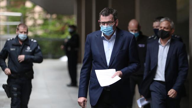 Premier Daniel Andrews arrives to announce a curfew for Melbourne and a two-week lockdown extension. Picture: NCA NewsWire / David Crosling