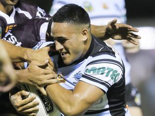 Valentine Holmes (Sharks #1) gets tackled - Brisbane Broncos v Cronulla Sharks at Dolphin Oval, Redcliffe. Pic Mark Cranitch.