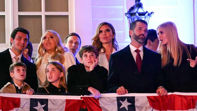 Michael Boulos, Tiffany Trump, Jared Kushner, Bettina Anderson, Donald Trump Jr and Ivanka Trump watch fireworks during a reception in honour of US President-elect Donald Trump. Picture: AFP