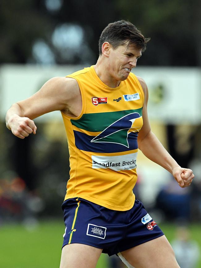 Eagle Andrew Ainger celebrates kicking a goal. Picture: Tom Huntley.