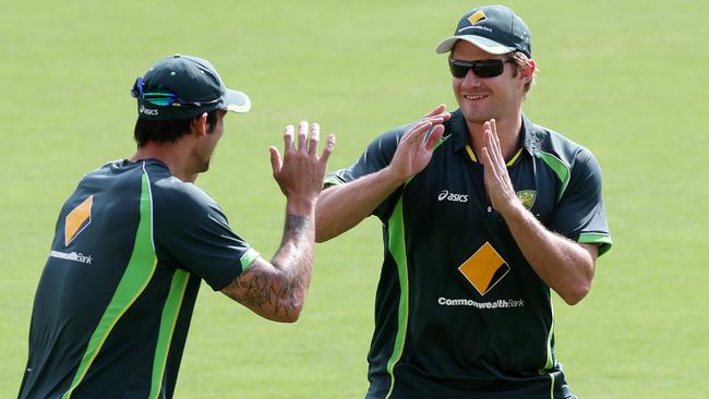 Mitchell Johnson (L) and Shane Watson (R) continued the play fighting well into their careers. Picture: Sarah Reed.